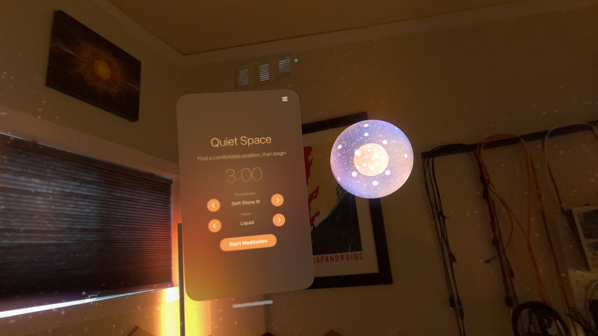 The orb beside the Quiet Space controls, with the Soft Stone III soundscape and the Liquid visual selected.