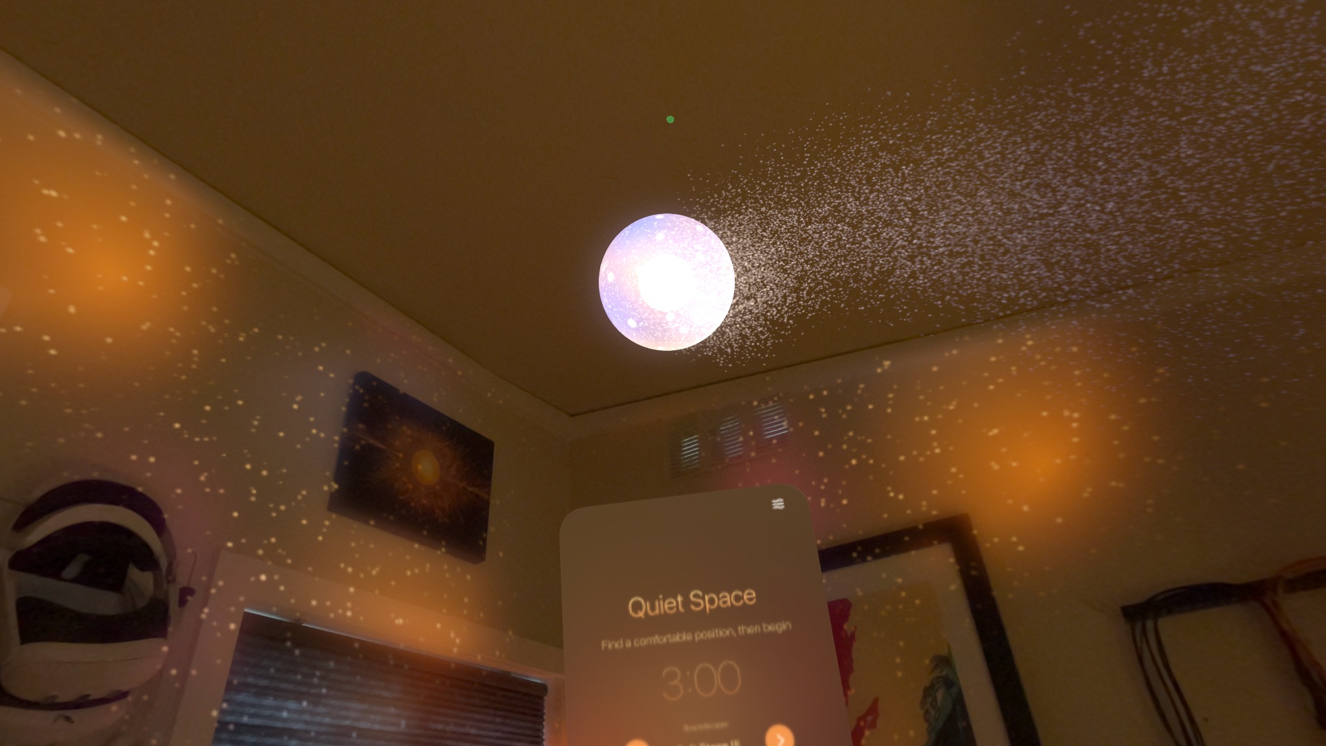 Fine particles stream away from the glowing orb across the ceiling.