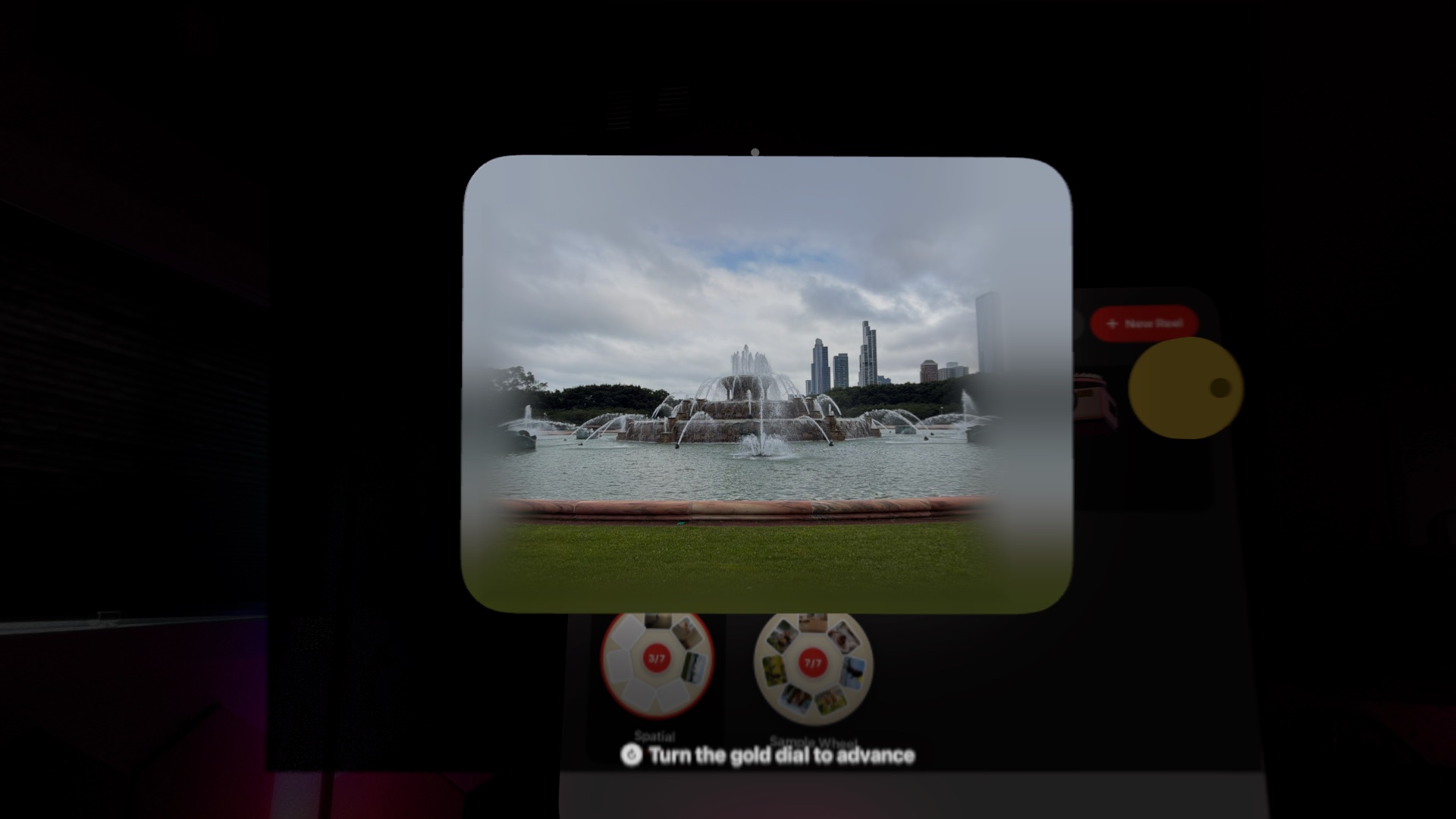 A spatial photo of a fountain and city skyline viewed through the Spatial Reel Viewfinder
